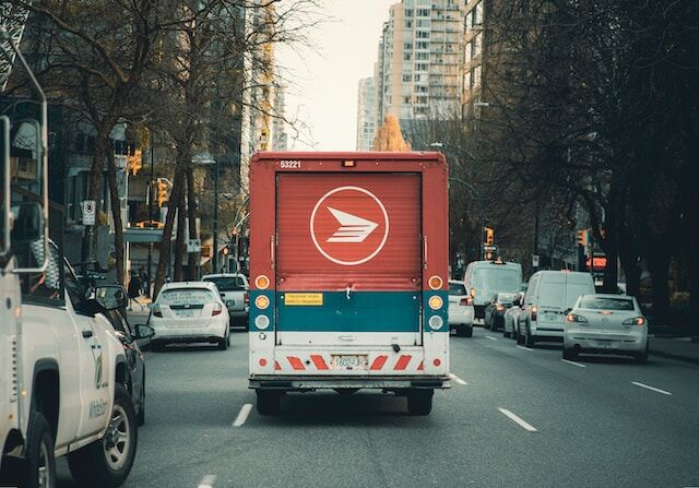 A truck on a designated route to deliver goods to customers.